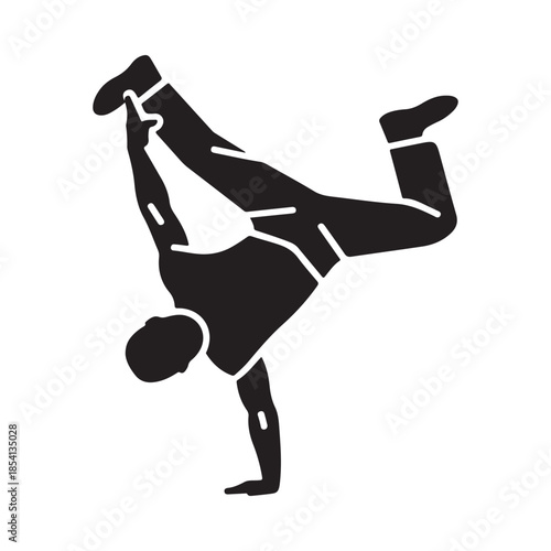 Black silhouette of a man performing a dynamic handstand breakdance pose