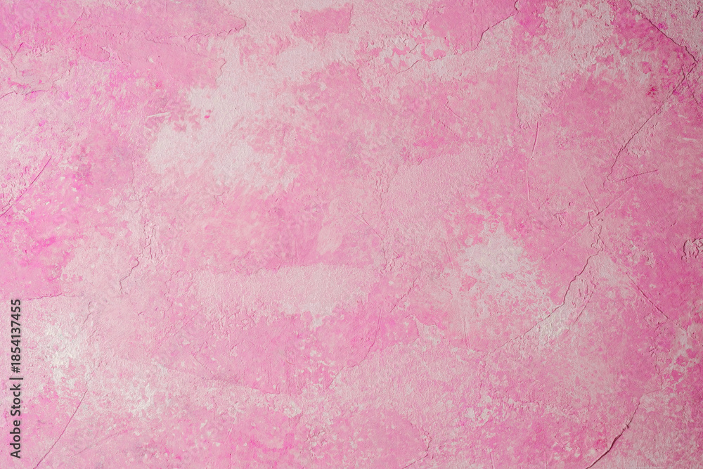 Fototapeta premium Pink abstract textured plaster wall background