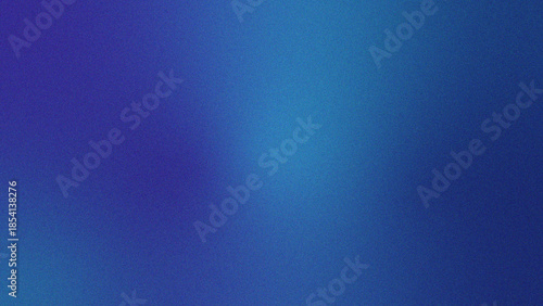 Deep blue and indigo grainy gradient background with soft light flare and noise texture