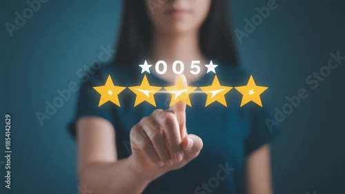Customer satisfaction and feedback concept, a person's hand touching a five-star rating system, showing excellent service evaluation