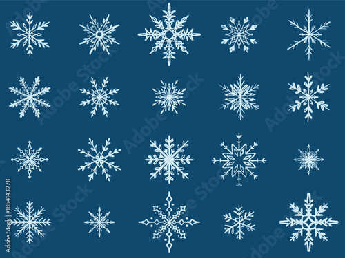 Hand drawn winter snowflakes set. Vector sketch illustration in vintage crayon charcoal style. Unique snow flakes patterns for holidays, Christmas, New Year
