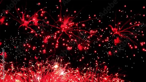 4K. loop seamless of real fireworks background golden shining fireworks with bokeh lights in the night sky. glowing fireworks show. New year's eve fireworks celebration multiple colors 
