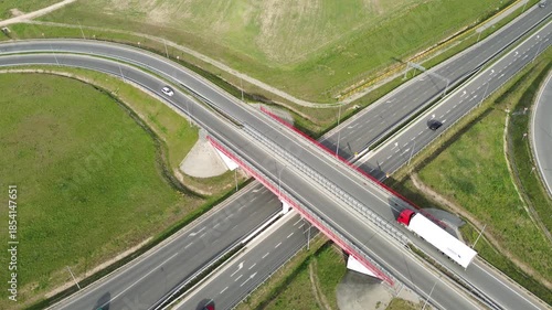 Heavy vehicles moving fast on a divided road