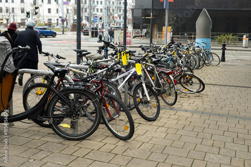 Wallpaper Mural Double-decker bicycle parking with various bicycles in an urban environment Torontodigital.ca