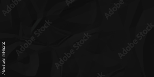 Crumple crushed black paper obsolete rumple craft design. wrinkle ripped creased crumple aged closeup recycled document grunge paper background.