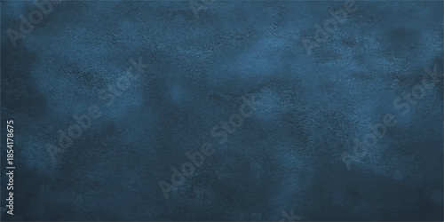A dark blue grunge texture features an aged paint pattern on a rough vintage wall surface to create a blank textured backdrop for design