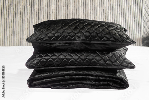 Elegant modern bedsheet with soft fabric texture, neatly arranged on a bed, showcasing comfort, cleanliness, and contemporary bedroom interior design