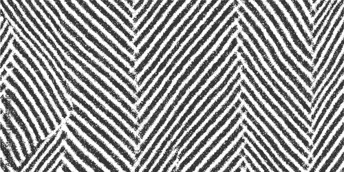 Black and white textured chevron pattern with rough diagonal lines abstract background