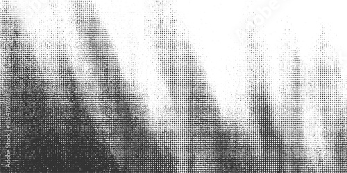 Black and white halftone pattern with gradient density and scattered dots abstract background