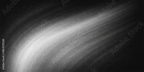 A polished sheet of brushed industrial steel creates a shiny metallic silver texture background with grey aluminum reflections on a sleek chrome surface pattern