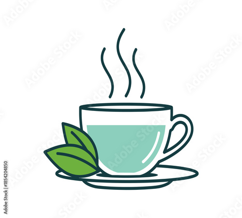 A steaming cup of teal green tea with fresh mint leaves on a saucer
