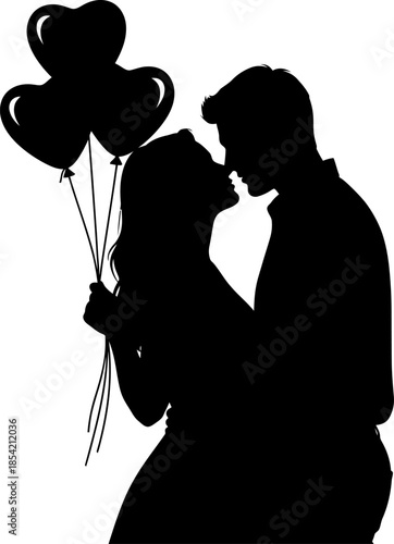 Silhouette of couple kissing and holding heart shaped balloons