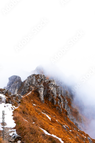 snow-capped mountain ridge among the clouds, Italy