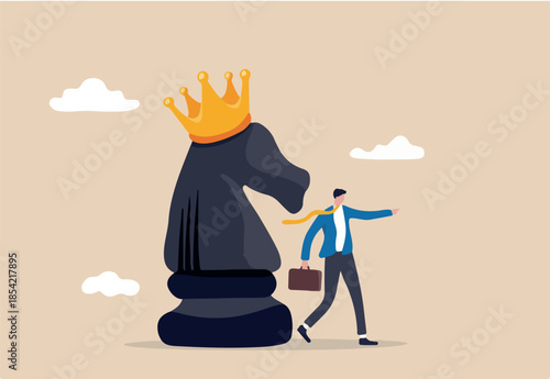 Strategy to win business competition, leadership to make decision, business challenge or tactic to overcome obstacle concept, smart businessman pointing finger to direct chess knight with king crown.