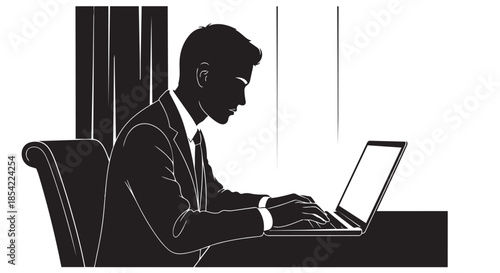 Focused professional in a suit diligently working on a laptop at a desk