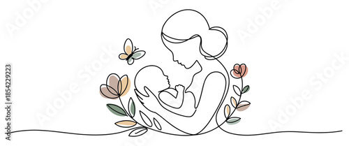 Mother holding newborn baby surrounded by flowers and butterfly