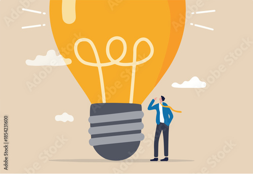 Think big, aspiration to win and success in business, big idea from creativity and imagination to overcome fear concept, smart businessman entrepreneur thinking with big oversized idea lightbulb.