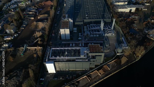 Data center building server cooling infrastructure. Dramatic aerial view drone