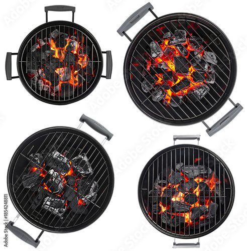 Four charcoal barbecue grills with glowing embers top view
