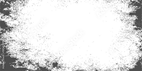 An abstract black ink splat creates a textured grunge pattern with liquid paint splashes and dark water drops on an old dusty wall design