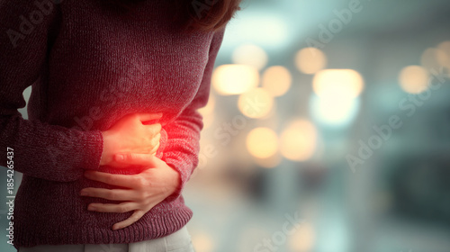 Woman Suffering from Irritable Bowel Syndrome, Severe Abdominal Pain with Red Glow Highlighting Discomfort