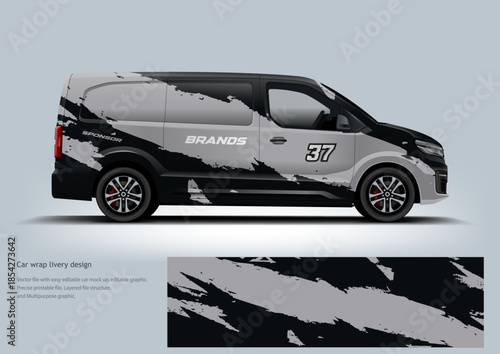 A bold monochrome racing wrap with high-contrast black and grey graphics for a stealthy motorsport look.