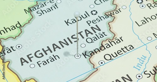A zoom out of a white pin into kandahar city of afghanistan political map