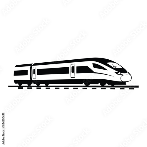 A sleek high speed train travels along the tracks a dramatic black silhouette