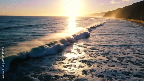Beautiful ocean waves crashing on the shore during a golden sunset, scenic view.