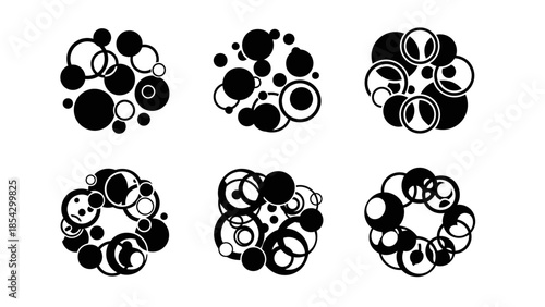 Abstract black and white circular patterns with variations in size and arrangement