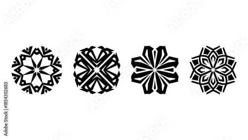 Collection of four intricate geometric snowflake-like patterns in black and white