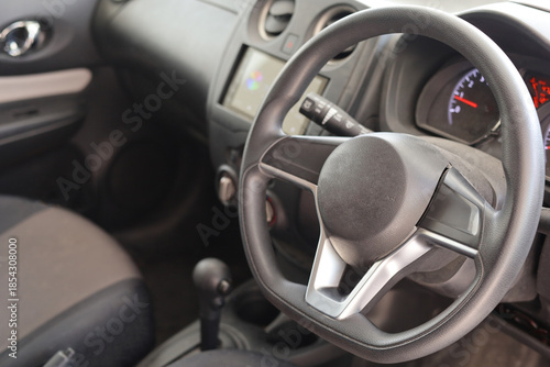 Modern Car Interior with Steering Wheel and Controls