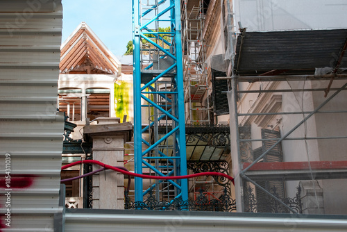 City Construction Site with Blue Crane and Scaffolding