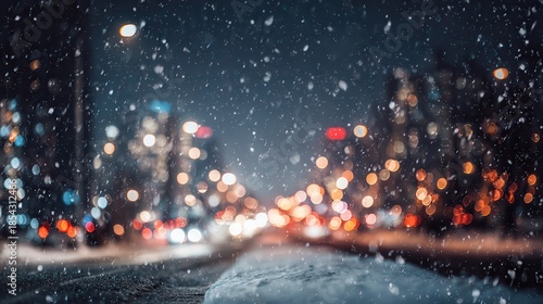 snowfall and defocused lights evening wintry city.