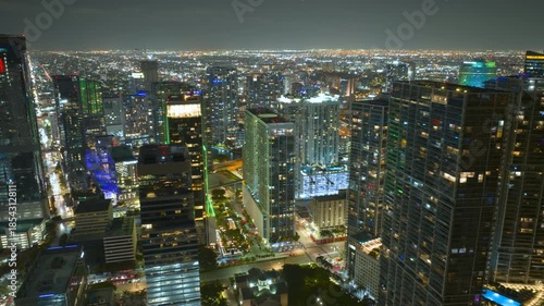 Wallpaper Mural Miami Brickell in Florida, USA at night. Timelapse of illuminated American downtown office district. Commercial and residential skyscraper buildings in modern US megapolis. Torontodigital.ca