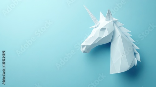 An origami unicorn head is displayed against a blue background