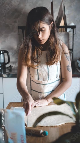 Sisters cooking a snack in their kitchen. Vertical videos.
