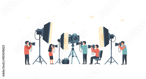 Photographers at work in a professional studio environment with lighting equipment.