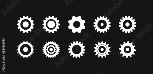 Professional set of white gear wheels on black background. Clean vector icons for mechanical engineering, industry settings, and system integration