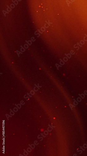 Red Background with Orange Glow and Particles.