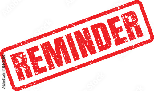 A bold red rectangular rubber stamp displaying the word REMINDER with a rustic textured effect on a white surface