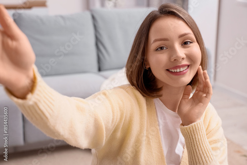 Beautiful young woman with ...
