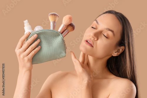 Beautiful young woman with ...