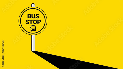 Bold Yellow Bus Stop Sign Casting Long Shadow.