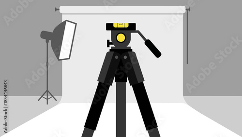 Professional Camera On Tripod In Studio Setup.