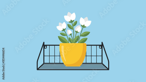 Potted plant with white flowers in a yellow pot.