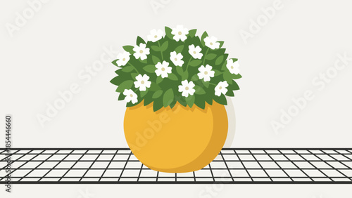 Potted flowering plant on grid table.