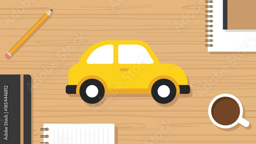 Yellow Toy Car on Wooden Desk with Stationery.