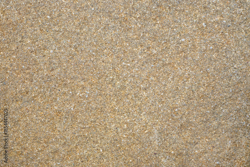 Stone texture, rock surface. Stone wall, sandstone. Gray-brown background.