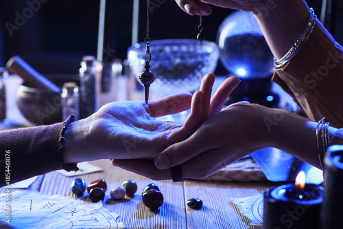 Fortune teller with pendulu...